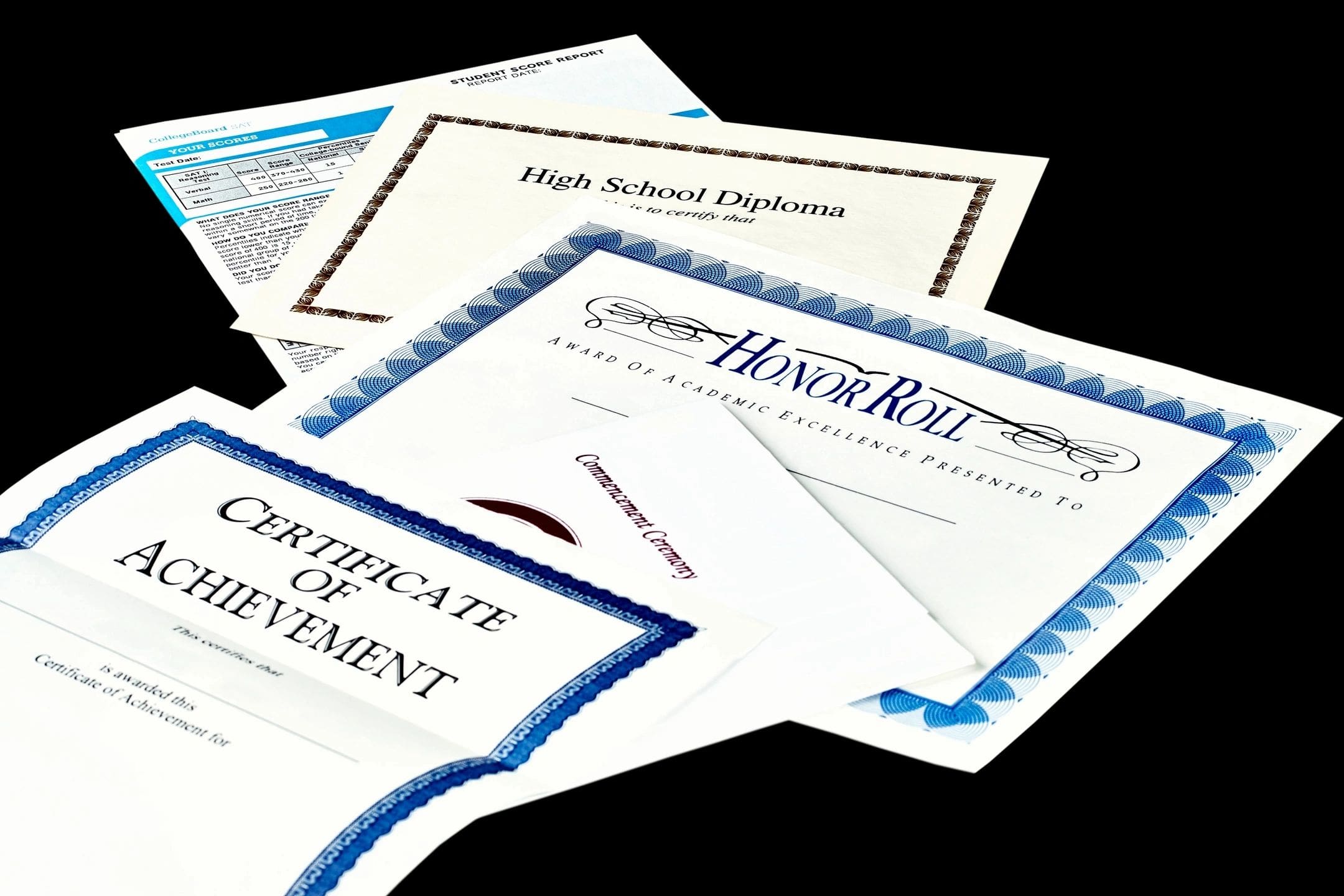 A pile of certificates and papers on top of each other.